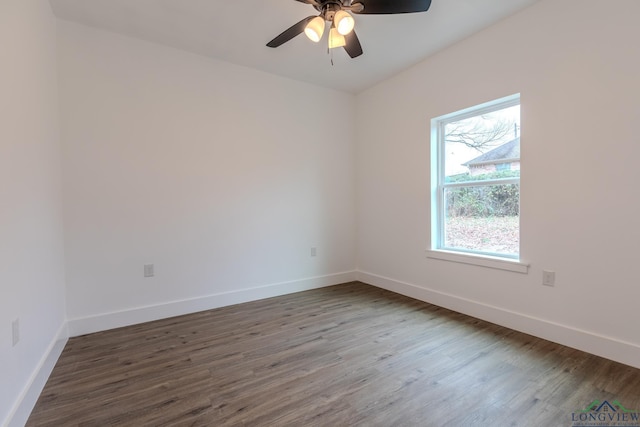 unfurnished room featuring ceiling fan and dark hardwood / wood-style floors