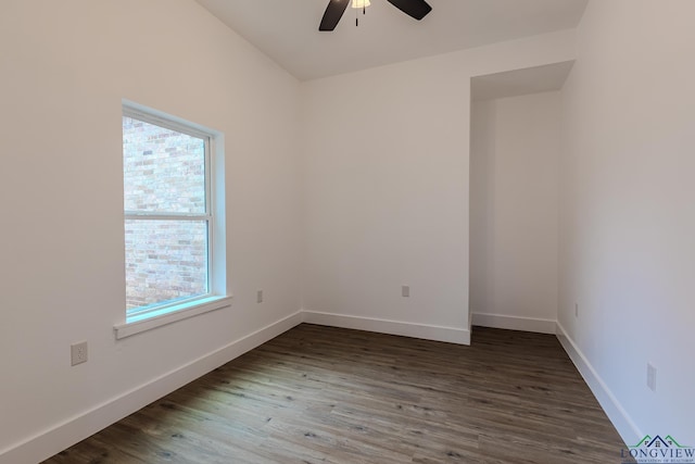 unfurnished room featuring hardwood / wood-style floors, a wealth of natural light, and ceiling fan