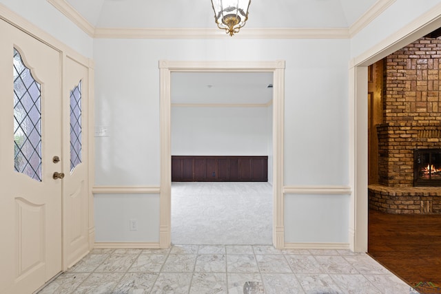 1 Rim Rd, Kilgore, TX 75662 - foyer featuring a brick fireplace and crown molding