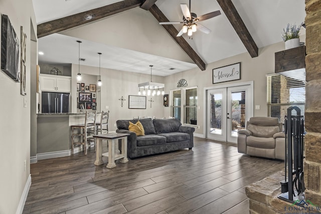 living room featuring beamed ceiling, ceiling fan with notable chandelier, high vaulted ceiling, and french doors