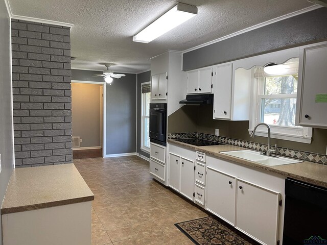 kitchen with tasteful backsplash, ceiling fan, under cabinet range hood, black appliances, and a sink