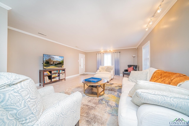 tiled living room with rail lighting and ornamental molding