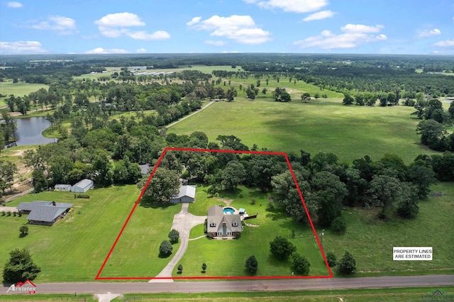 1463 County Road 106, Carthage, TX 75633 - overview of rural landscape with property parcel outlined and a nearby body of water
