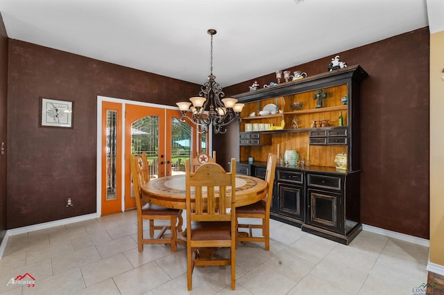 1463 County Road 106, Carthage, TX 75633 - dining space featuring a chandelier, french doors, and light tile patterned flooring