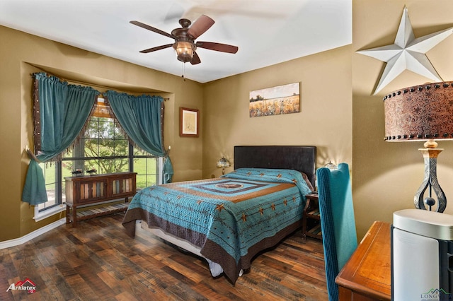 1463 County Road 106, Carthage, TX 75633 - bedroom featuring wood finished floors and a ceiling fan