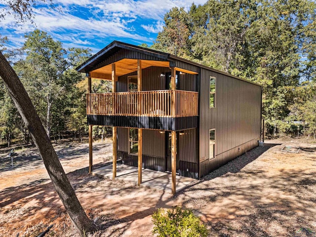 view of front of home with a deck