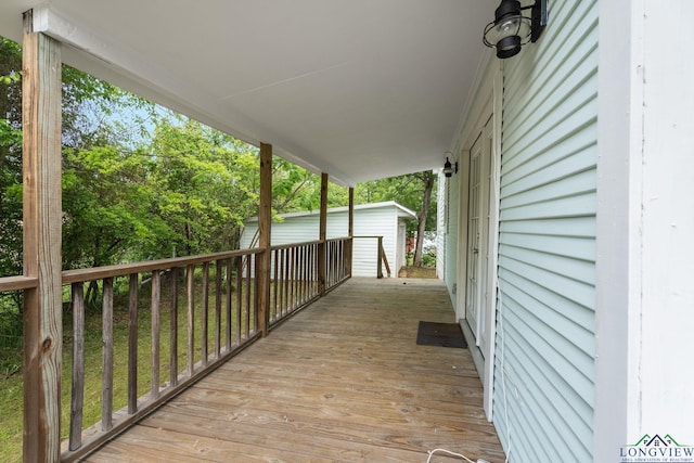 deck with an outbuilding
