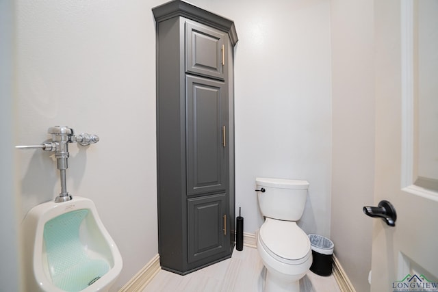 bathroom featuring toilet