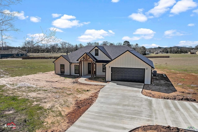 modern inspired farmhouse featuring driveway, roof with shingles, board and batten siding, and an attached garage