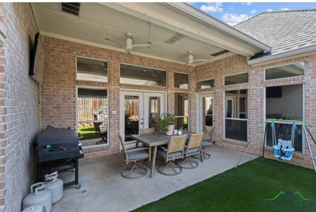 view of patio / terrace with ceiling fan and grilling area