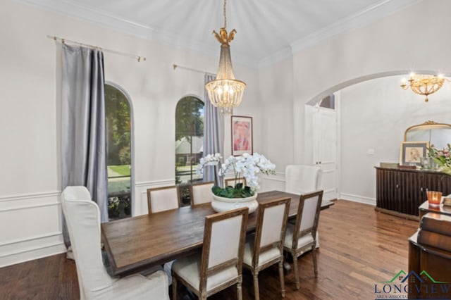 dining room with a chandelier, dark hardwood / wood-style flooring, and crown molding