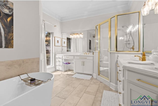 bathroom featuring tile patterned floors, separate shower and tub, crown molding, and vanity