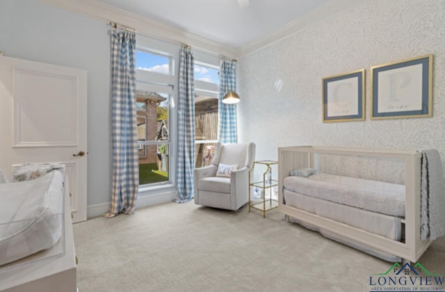 bedroom featuring carpet flooring and crown molding