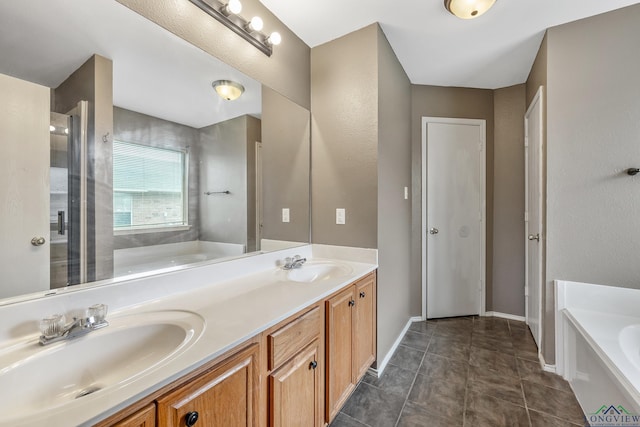 207 Willow Rd, Bullard, TX 75757 - full bathroom featuring double vanity, a sink, baseboards, and a garden tub
