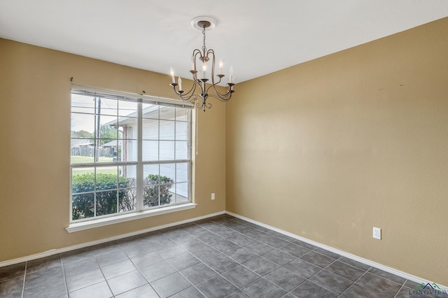 207 Willow Rd, Bullard, TX 75757 - unfurnished room with baseboards and a chandelier