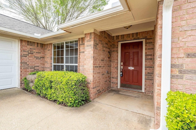 207 Willow Rd, Bullard, TX 75757 - property entrance featuring a shingled roof and brick siding