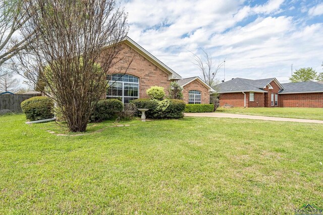 207 Willow Rd, Bullard, TX 75757 - single story home featuring brick siding, fence, and a front lawn