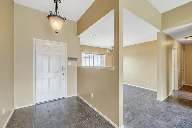 207 Willow Rd, Bullard, TX 75757 - foyer entrance featuring baseboards, visible vents, and a notable chandelier