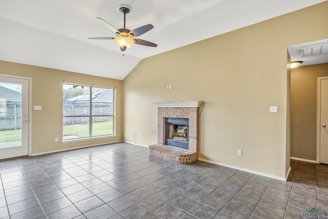 207 Willow Rd, Bullard, TX 75757 - unfurnished living room featuring ceiling fan, vaulted ceiling, tile patterned flooring, and a brick fireplace