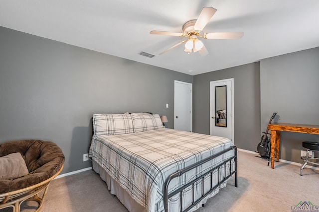 carpeted bedroom featuring ceiling fan