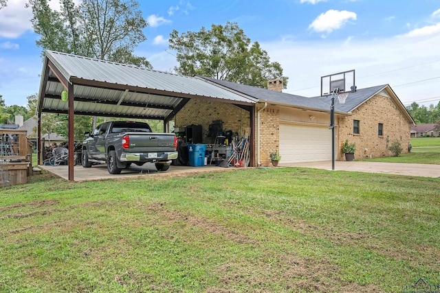 exterior space featuring a yard, a garage, and a carport