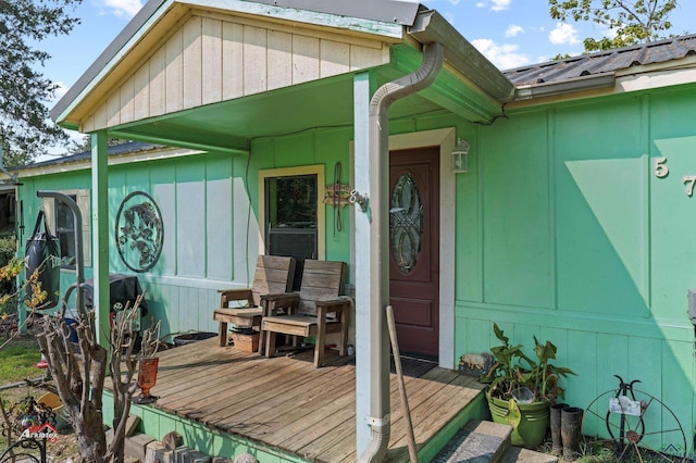 doorway to property featuring a deck