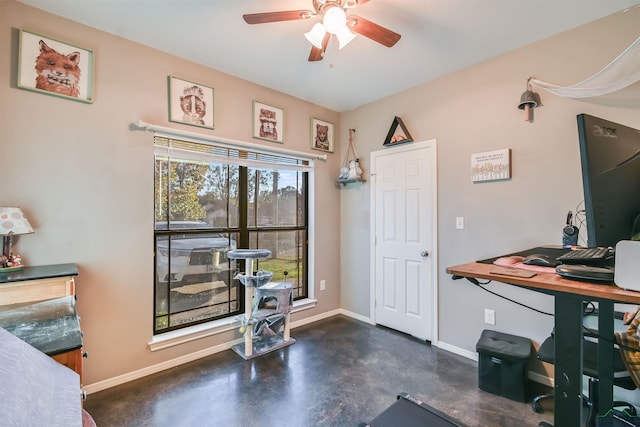 interior space with ceiling fan