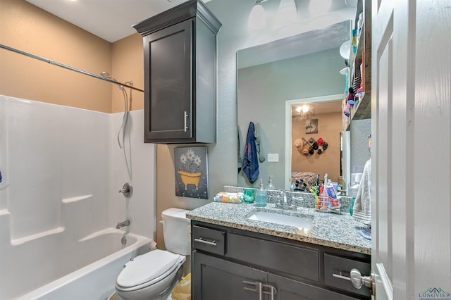 full bathroom featuring vanity, shower / bathing tub combination, and toilet