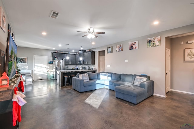 living room featuring ceiling fan