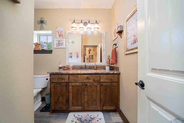 4754 Deer Rd, Gilmer, TX 75644 - bathroom featuring toilet and vanity