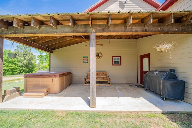 4754 Deer Rd, Gilmer, TX 75644 - view of patio / terrace with a hot tub and area for grilling