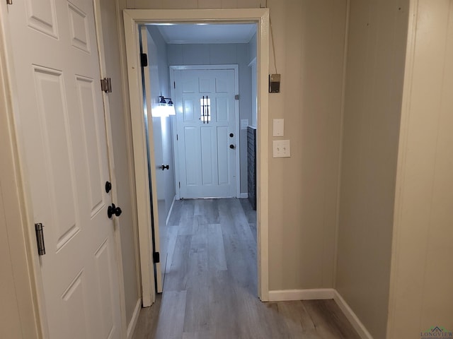 711 Wildwood Rd, Daingerfield, TX 75638 - corridor with baseboards and wood finished floors