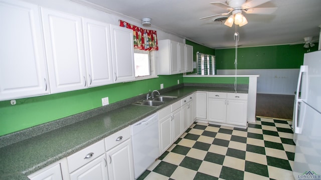 kitchen with white cabinets, white appliances, ceiling fan, and sink