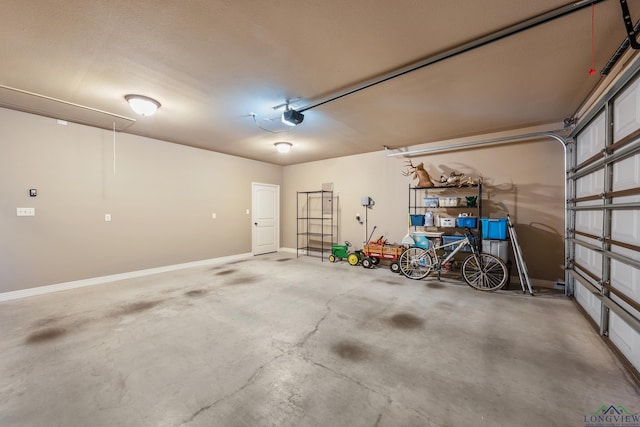 garage featuring a garage door opener