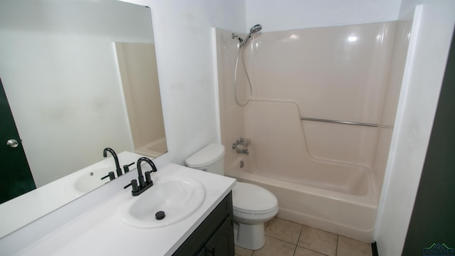 full bathroom with tile patterned flooring, vanity,  shower combination, and toilet