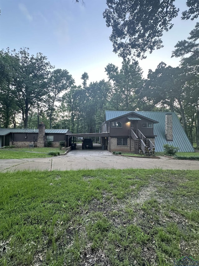 exterior space featuring a carport