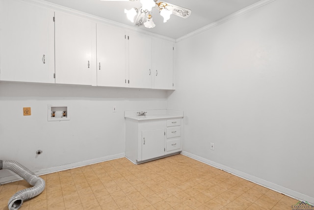 washroom featuring cabinet space, a ceiling fan, crown molding, light floors, and gas dryer hookup
