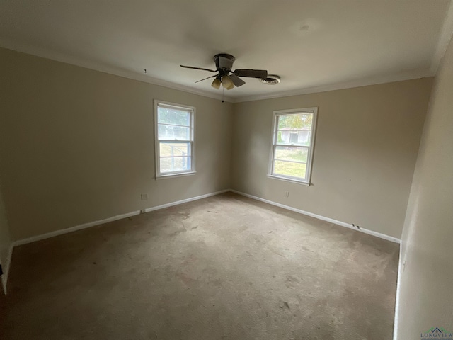 402 Mark Dr, Marshall, TX 75672 - carpeted spare room featuring plenty of natural light and ornamental molding