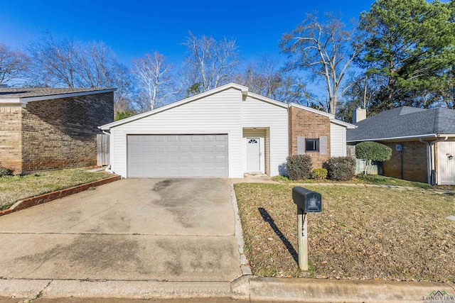 single story home with a garage