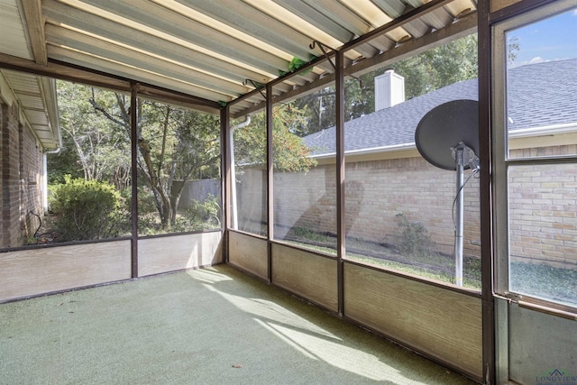 unfurnished sunroom with a wealth of natural light