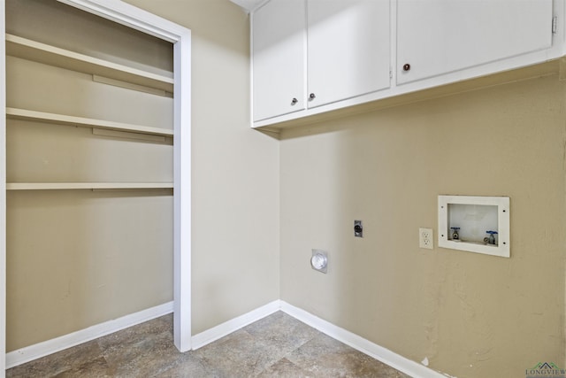 clothes washing area with cabinets, washer hookup, and electric dryer hookup