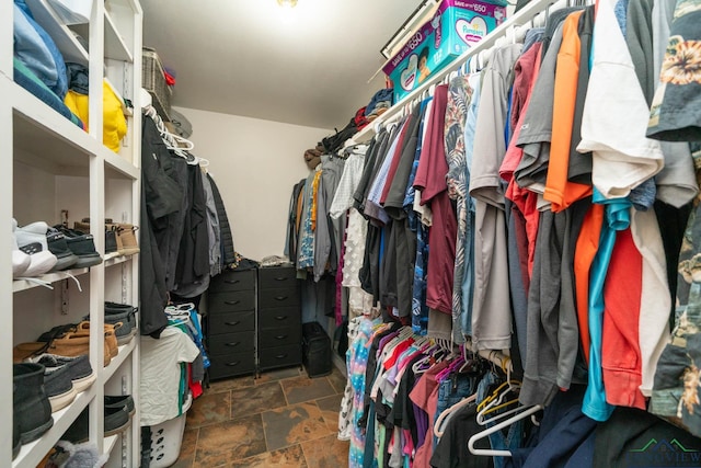 901 N Whatley Rd, White, TX 75693 - walk in closet with stone finish flooring