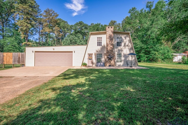 901 N Whatley Rd, White, TX 75693 - view of front of property featuring a chimney, concrete driveway, and an attached garage