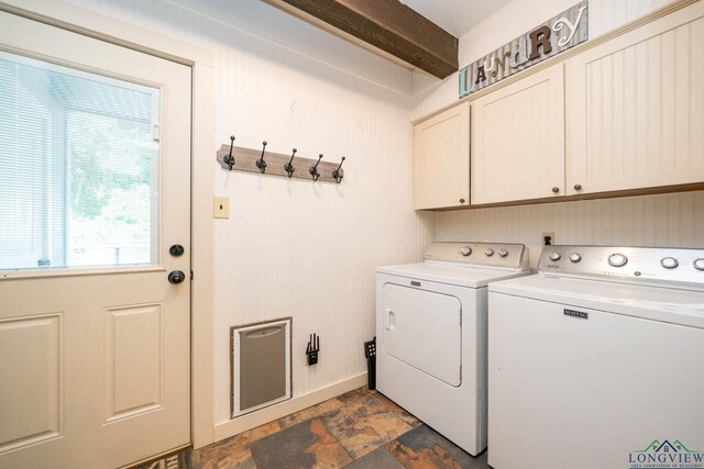 901 N Whatley Rd, White, TX 75693 - laundry area with cabinet space, washer and dryer, and stone finish floors