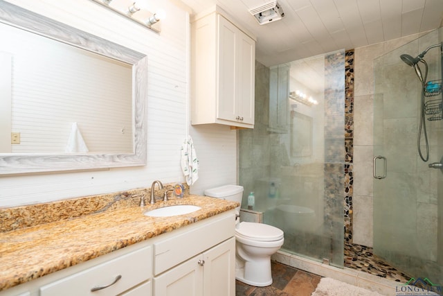 901 N Whatley Rd, White, TX 75693 - bathroom with toilet, a stall shower, and vanity