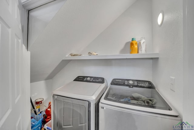 laundry area with independent washer and dryer