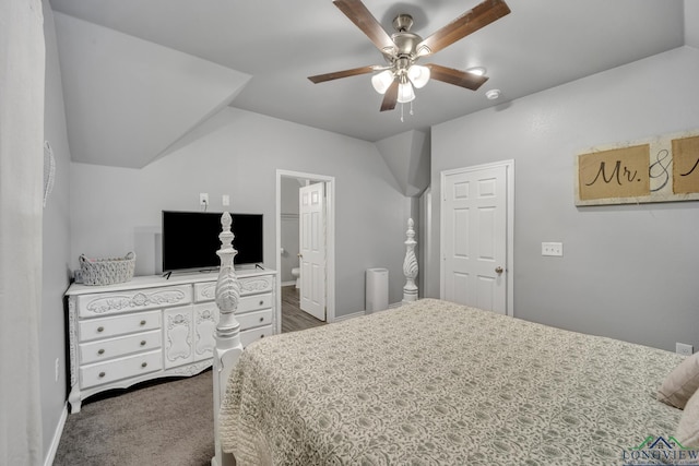 carpeted bedroom with connected bathroom and ceiling fan