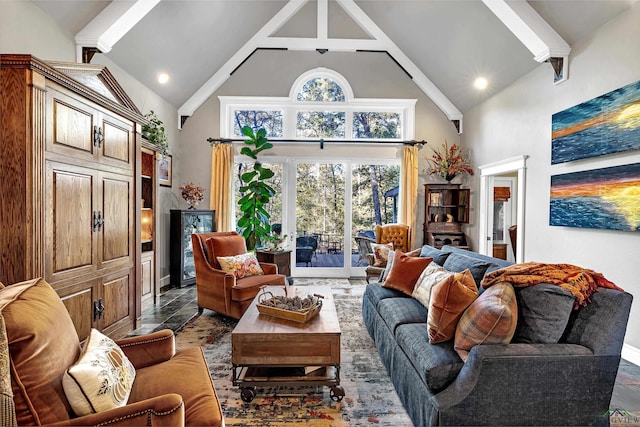 living room with high vaulted ceiling