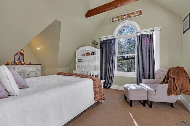 bedroom featuring lofted ceiling with beams and carpet floors