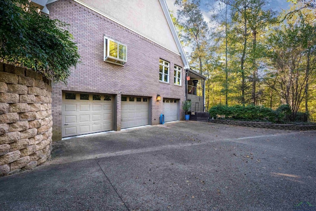 view of home's exterior featuring a garage